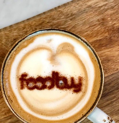 Cappuccino cup with Foodbuy brand mane